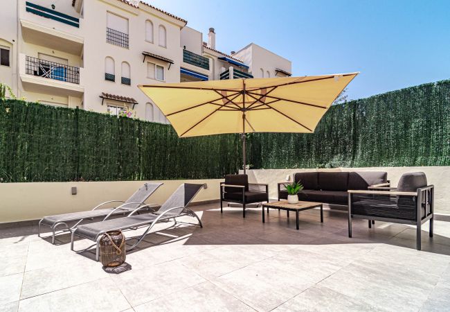 Lejlighed i Nueva andalucia - LCR1- Lovely ground floor apartment, Puerto Banus